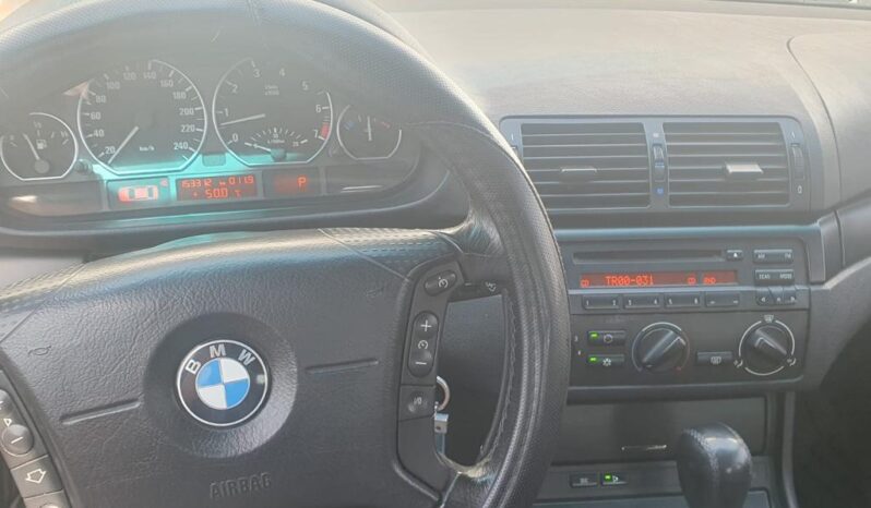 BMW 320i lleno